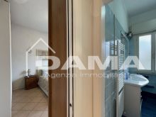 Ampio bilocale con terrazzo perimetrale e posto auto_DIS01