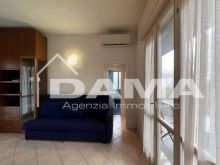 Ampio bilocale con terrazzo perimetrale e posto auto_SOGGIORNOCUCINA04